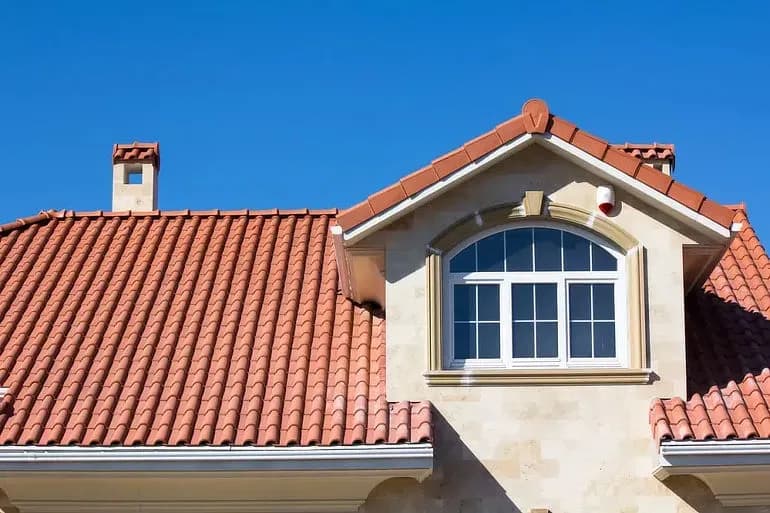 6668e5840db8fdb01a57dd5f_clay-roof-tiles-on-home.webp