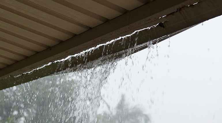 Cracked eavestroughs leaking rain