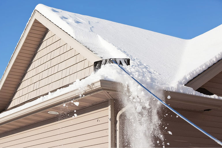 Roof rake to remove snow on roof